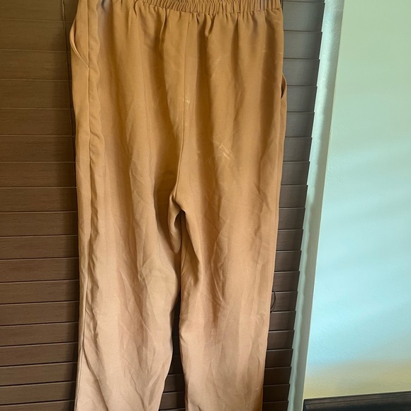FAVLUX Pants - Small pants like a rust color.  Lighting has the color wrong